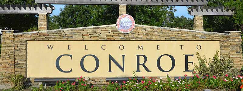 Cleaning Conroe Texas Sign