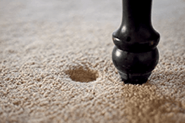 removing furniture dents in carpet